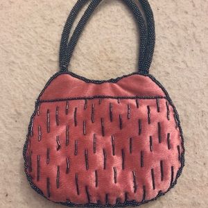 Bloomingdales pink velvet and grey beaded bag.